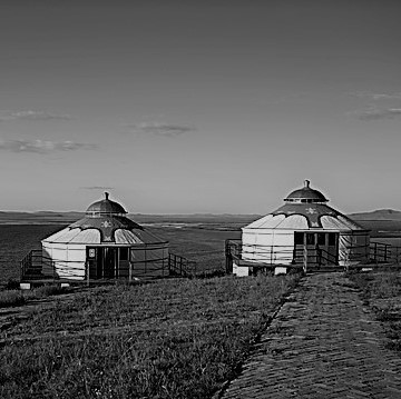 Black and white picture of yurts