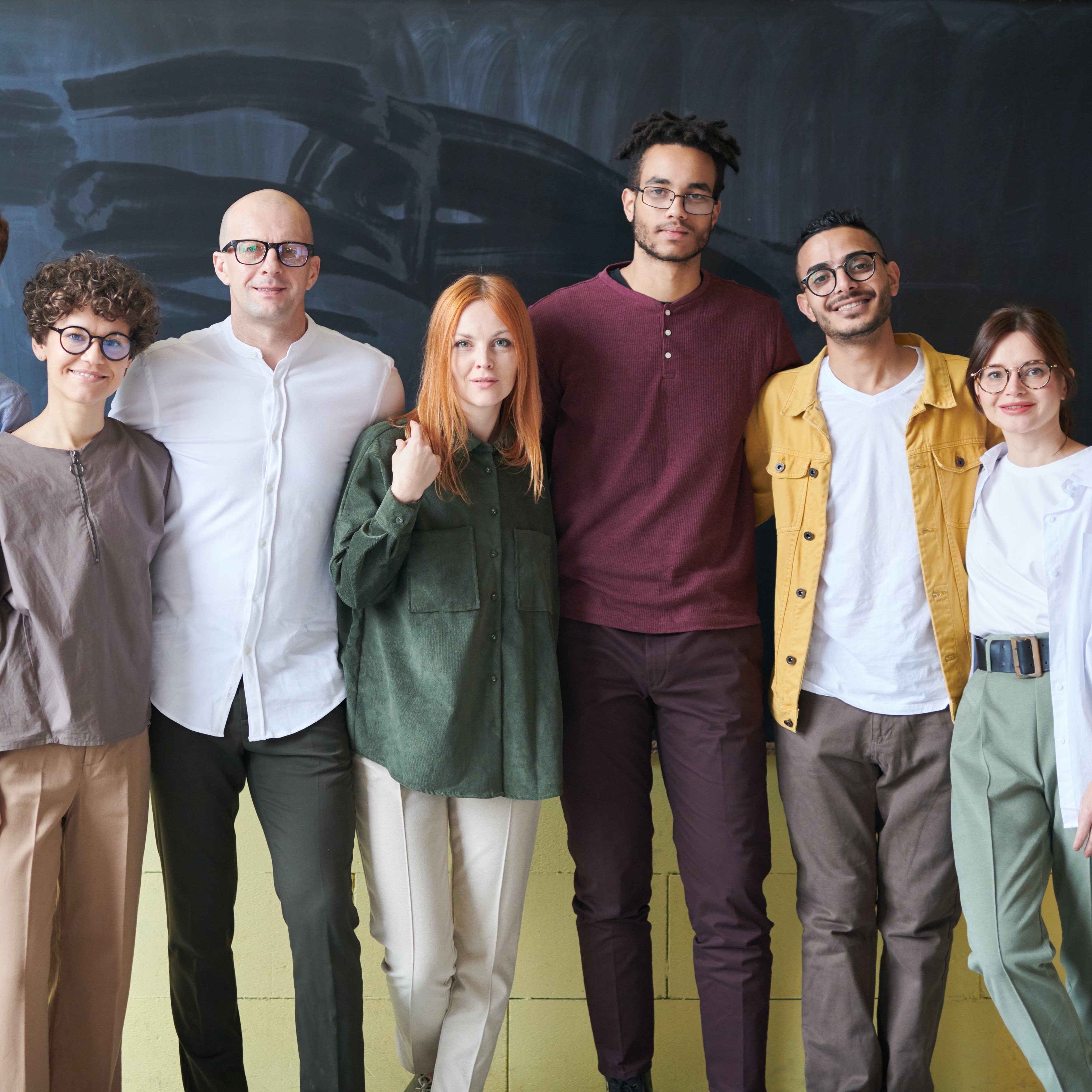 Six people taking a group picture